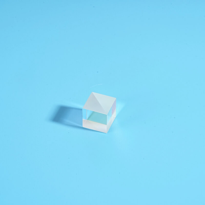 Broadband polarizing beam splitter prism